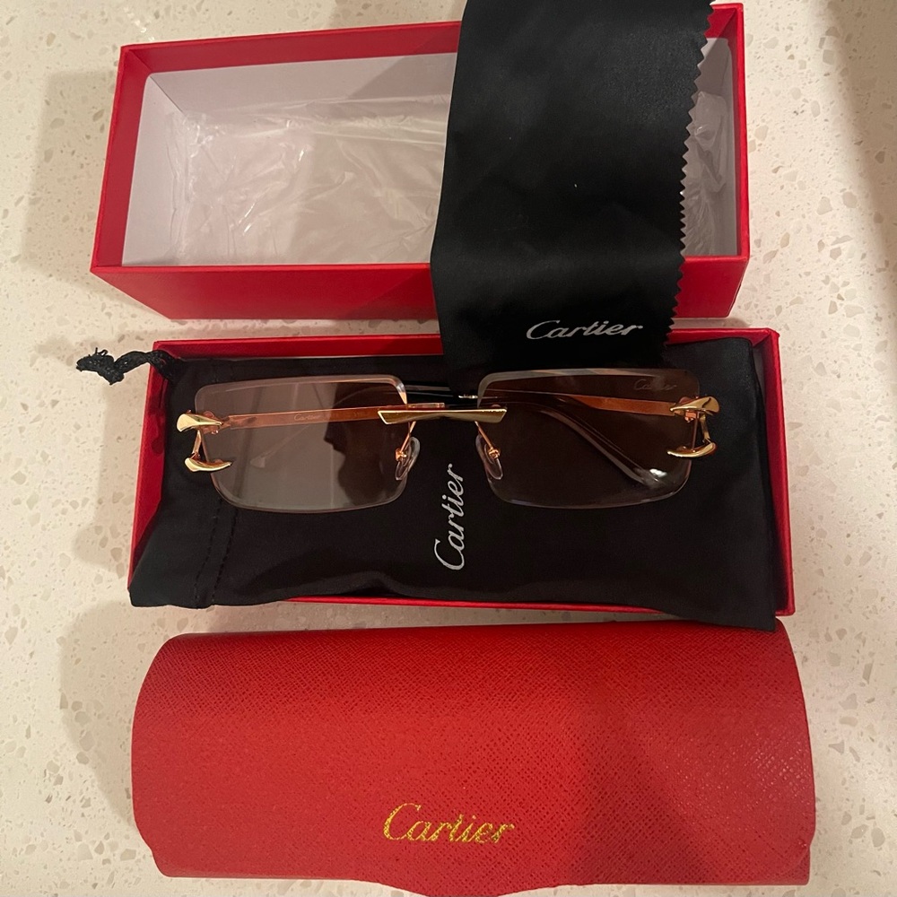 Cartier Gold and Pink Rimless Sunglasses